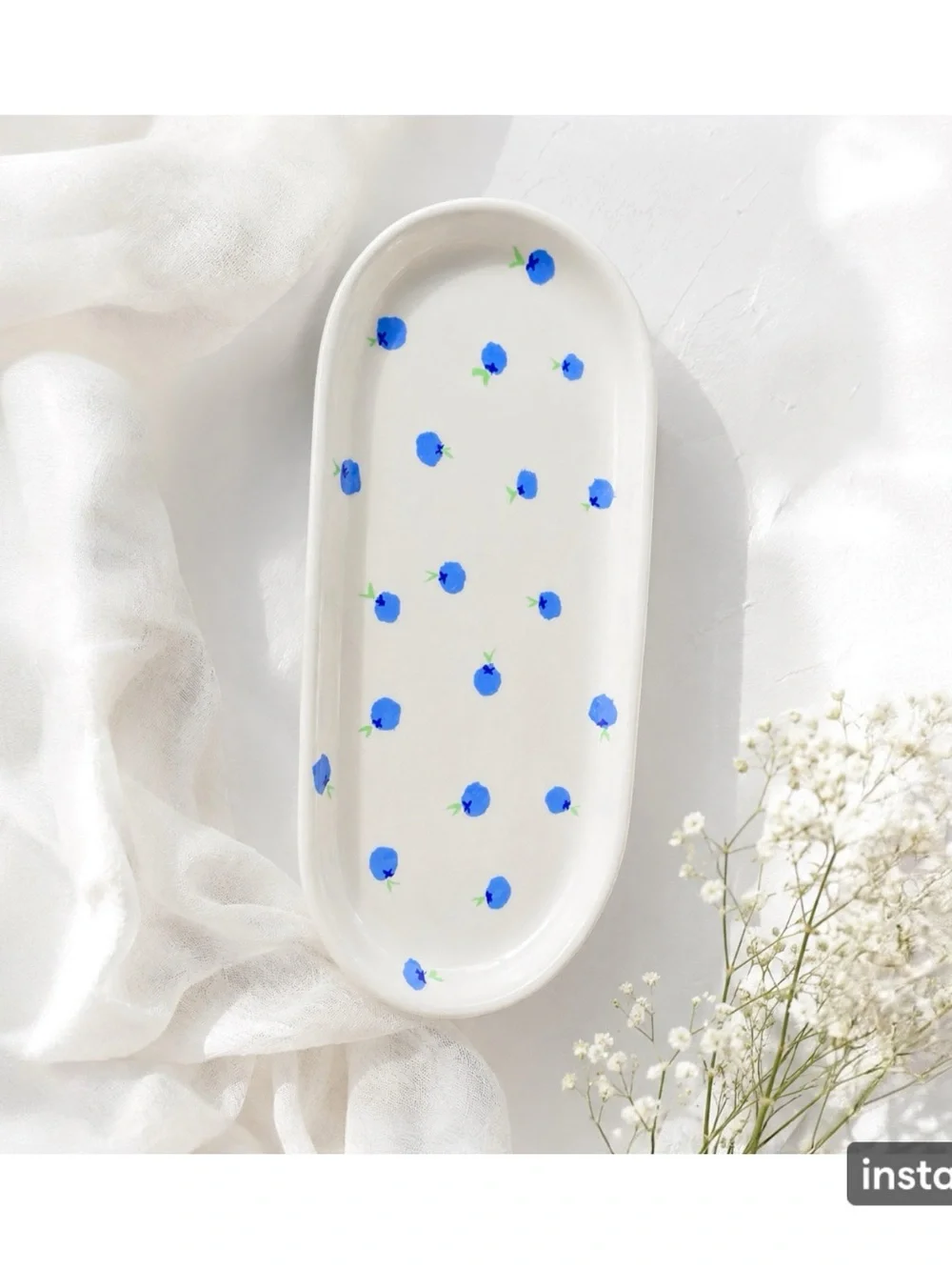 Ceramic White Jewelry Tray with Blue Dot Pattern and White Candle